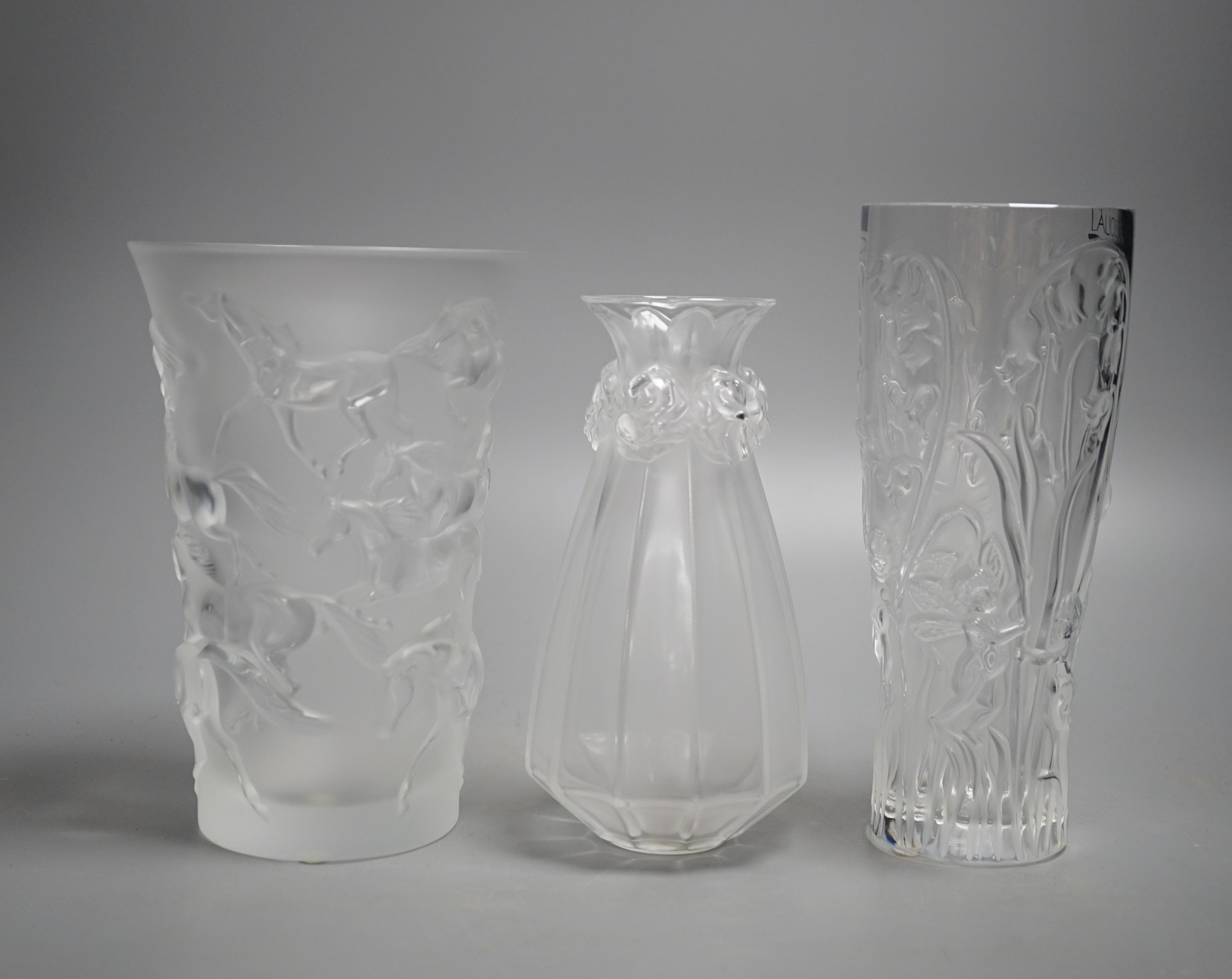 Three modern Lalique frosted glass vases - Oeillets (Carnations), Mustang and Elves pattern, tallest 20cm
